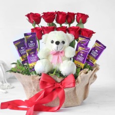 Roses N Dairy Milk Chocolate N Teddy Bear With Basket Arrangement