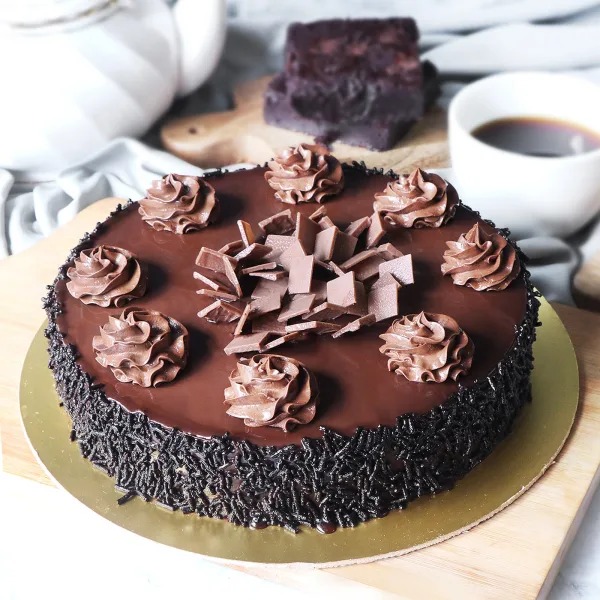 guinness chocolate cake with brown butter frosting - Blue Bowl